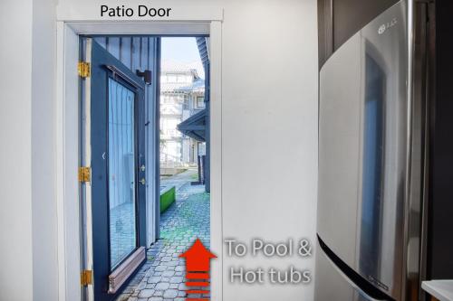 an image of an open door with a red arrow at Modern Studio at Blackcomb base in Whistler