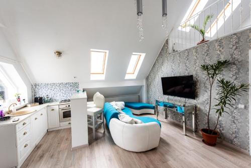 Μια τηλεόραση ή/και κέντρο ψυχαγωγίας στο Enygma Penthouse
