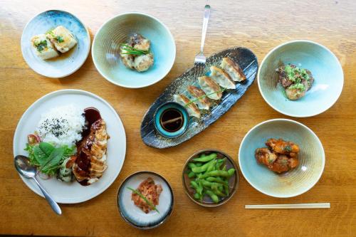 a group of plates of food on a table at Green Rooms in London