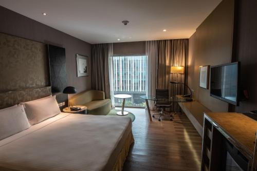 Un ou plusieurs lits dans un hébergement de l'établissement Holiday Inn New Delhi Aerocity by IHG