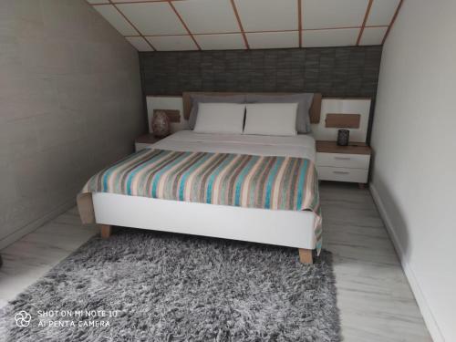 Ένα ή περισσότερα κρεβάτια σε δωμάτιο στο villa Areca