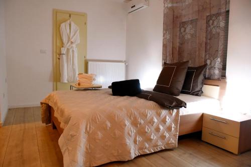 Postel nebo postele na pokoji v ubytování CIRIĆ APARTMANI