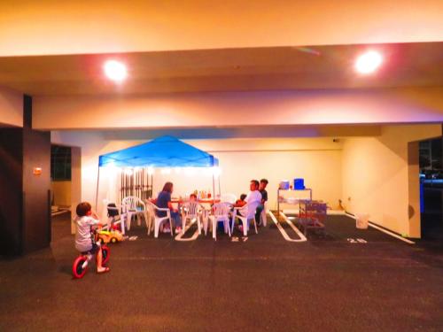 a group of people sitting around a table in a room at Ao-Ao-Hotel - Vacation STAY 29367v in Nago