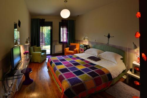 Ένα ή περισσότερα κρεβάτια σε δωμάτιο στο Ξενοδοχείο Άστρα
