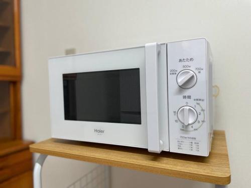 えのきや小泊 Enokiya Kodomariにあるキッチンまたは簡易キッチン
