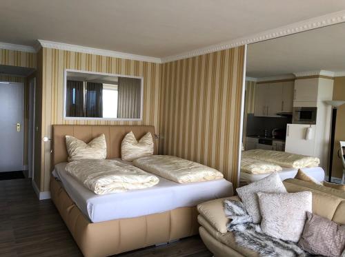 Легло или легла в стая в Tiffanys Ferienapartments in der Privatresidenz des Plaza Premium Hotel Timmendorfer Strand