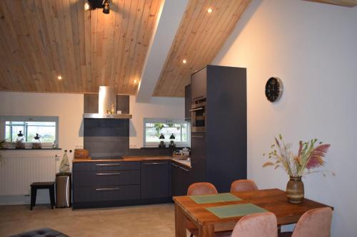 Kuchyň nebo kuchyňský kout v ubytování Bed & Breakfast 't Boerenhart