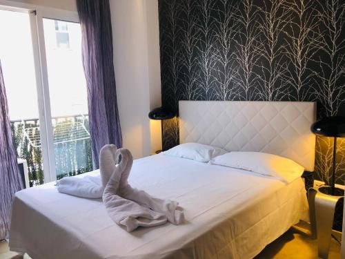 Posteľ alebo postele v izbe v ubytovaní COZY STUDIO MALAGA CENTRO by AlohaMalaga