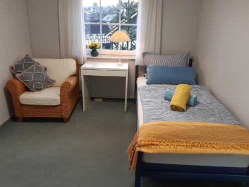 Postel nebo postele na pokoji v ubytování Ferienwohnung am Ölsbach