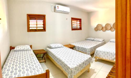 En eller flere senger på et rom på Flats Villa Gelú