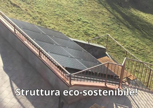 an overhead view of a roof with solar panels at Home Iseo Lake in Bossico