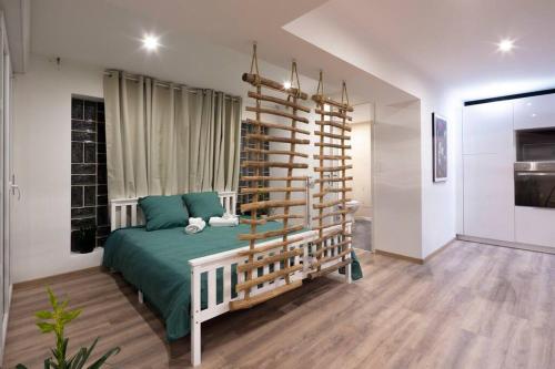 Ένα ή περισσότερα κρεβάτια σε δωμάτιο στο Le Logis d'Alsace, Wifi,TV,Parking,70 m2