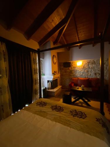 Katil atau katil-katil dalam bilik di Paramythenio Guesthouse