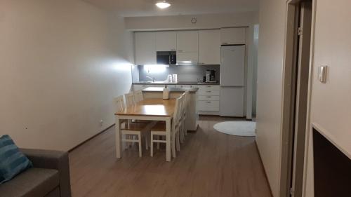 Kuchyň nebo kuchyňský kout v ubytování Lehtikatu Apartments