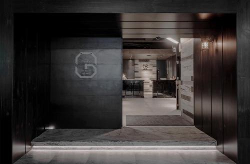 an entrance to a building with a hallway at Calligraphy Greenway Hotel in Taichung