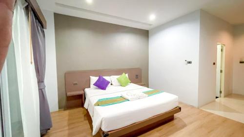 Cama o camas de una habitación en The S.G Hotel