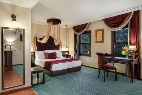 מיטה או מיטות בחדר ב-Chatto Hotel