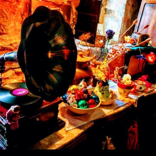 a table with bowls of food and a pot on it at Casa rural la Quinta in Valeria