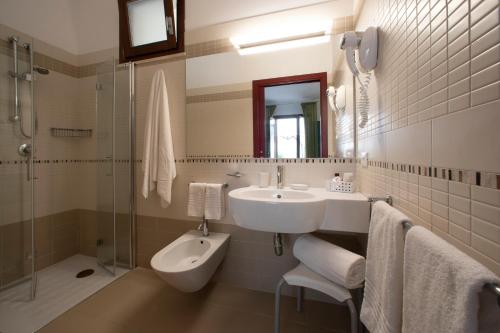 Kúpeľňa v ubytovaní Insula Hotel