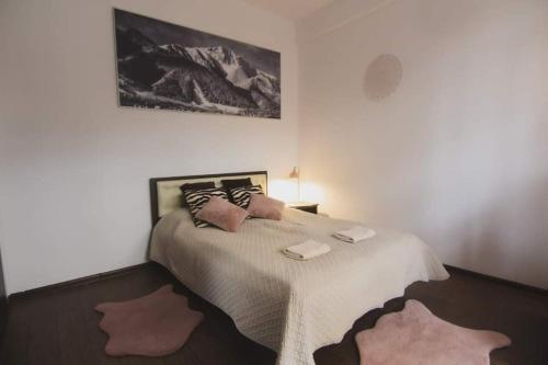 Кровать или кровати в номере Apartament Górski - SPA pod Nosalem
