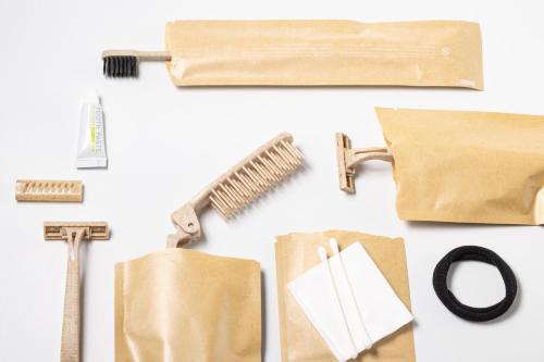a bunch of items that include a paper bag and scissors at ORI Kyoto in Kyoto