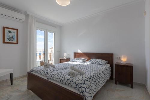 Ένα ή περισσότερα κρεβάτια σε δωμάτιο στο Lovely Townhouse Fuengirola