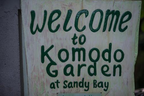 a sign that reads welcome to koma garden at sandy bay at Komodo Garden in Nusa Lembongan