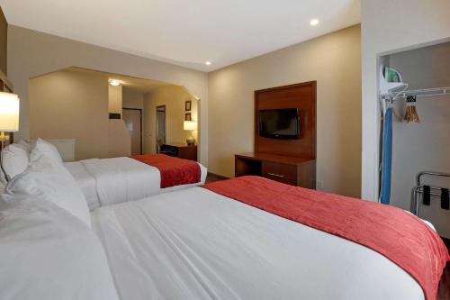 Ένα ή περισσότερα κρεβάτια σε δωμάτιο στο Comfort Suites Columbus Expo Center