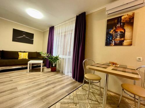 Χώρος καθιστικού στο Cozy apartments on Schmidta street