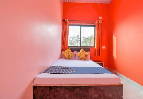 Katil atau katil-katil dalam bilik di Hotel Nisarg Lodging And Restaurant