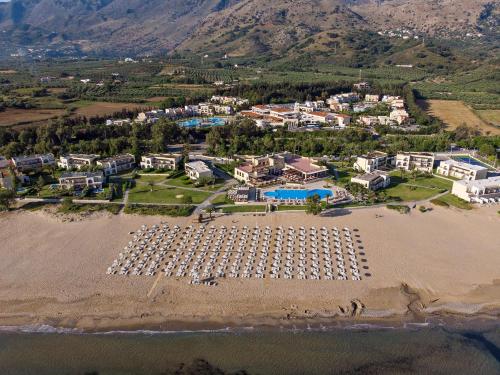 an aerial view of a resort on a beach at Pilot Beach Resort in Georgioupolis