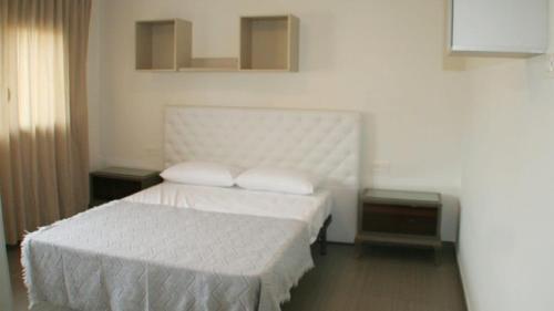A bed or beds in a room at Villa Jupiter con piscina privada