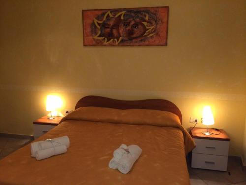 Ένα ή περισσότερα κρεβάτια σε δωμάτιο στο Hotel Le 3 Fonti