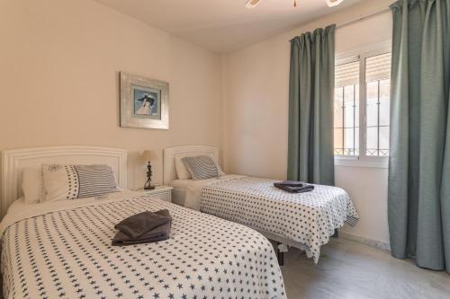 Postel nebo postele na pokoji v ubytování Homely Apartment