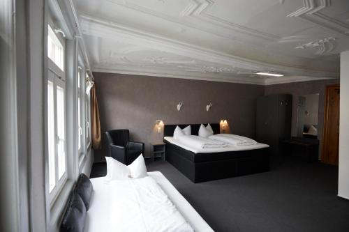 Кровать или кровати в номере Hotel Schlemmer