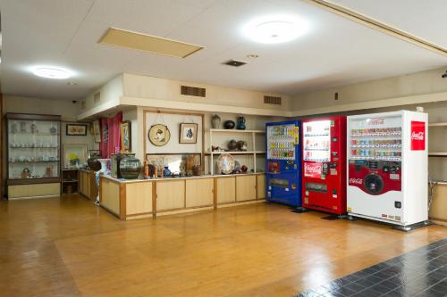 a room with two vending machines and a counter at kinugawaonsen Fukumatsu in Nikko