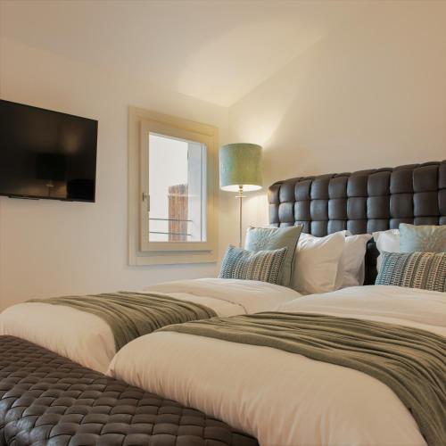 Postel nebo postele na pokoji v ubytování ELEGANCE ROOM - Aparta & Suite - Automatized Apartment