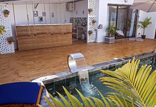 Un lugar para sentarse en Lilie location manapany 4 étoiles