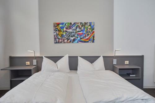 Кровать или кровати в номере Hotel Schlemmer