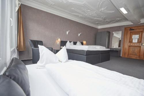 Кровать или кровати в номере Hotel Schlemmer