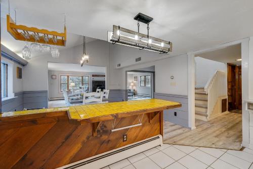 a kitchen with a wooden counter top in a room at Killington Mountain Home! HotTub & 5 min to Skiing! in Killington