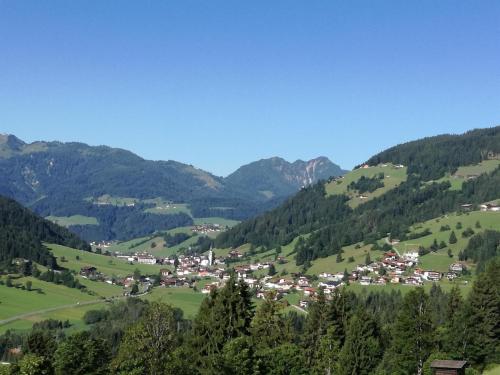 a small town in a valley in the mountains at Ferienwohnung Aschaber in Wildschönau