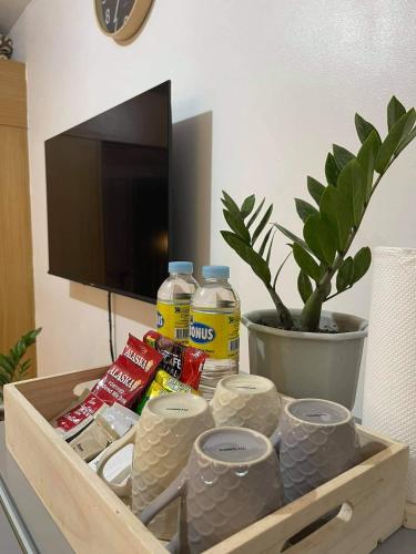 TV a/nebo společenská místnost v ubytování MOA staycation Shell Residences Pasay city darpm