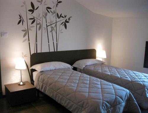 Low Cost Ferrara tesisinde bir odada yatak veya yataklar