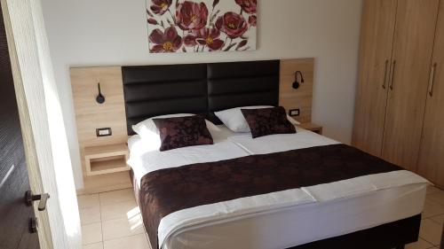 Postel nebo postele na pokoji v ubytování Premium Appartments Suha Punta
