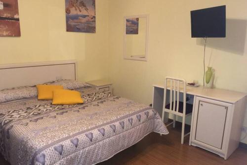 Postel nebo postele na pokoji v ubytování La Stregatta