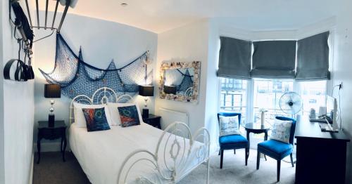 Cama o camas de una habitación en Grand Pier Guest House