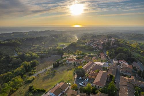 an aerial view of a small town in the sunset at Beatabb in Guardistallo