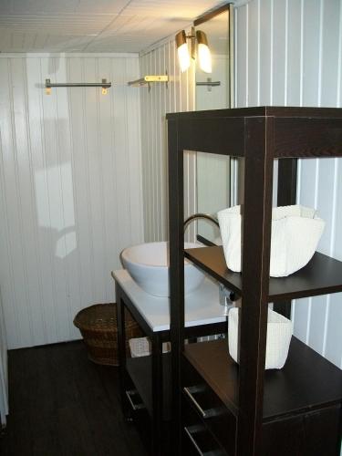 a bathroom with a sink and a mirror at Eifelhoeve in Benenberg in Hellenthal
