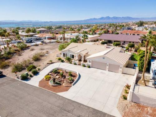 an aerial view of a house with a yard at Grand Havasu Oasis with Custom Pool & Spa! in Lake Havasu City